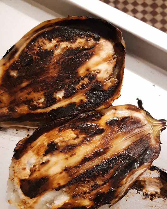 cariocakitchen's tweet photo. The start of a Babaganoush 🍆(And excuse to use the aubergine emoji). Nicely burnt on the hob then roasted. I like to make it like this:  Flesh is  scooped into processor with tahini, lemon, salt, pepper and olive oil. And a little zaatar, and blended… https://t.co/DZ27Ayw3iD https://t.co/JhNLVsLrdL