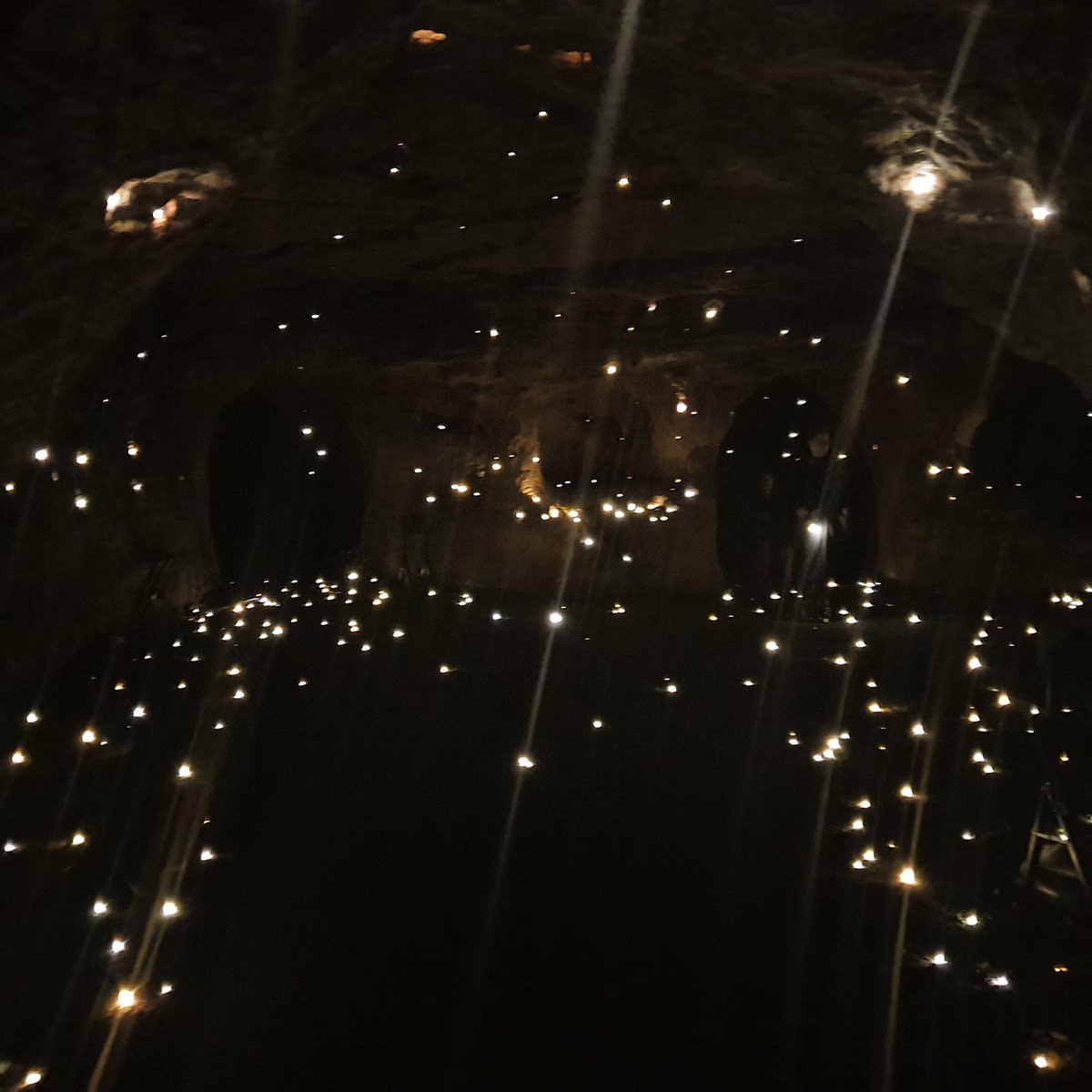 artspired's tweet photo. #wearewarriors part of #inbetweentime 2019 in #redcliffecaves- every point of light a tribute to the silenced https://t.co/7hI59sRGtB
