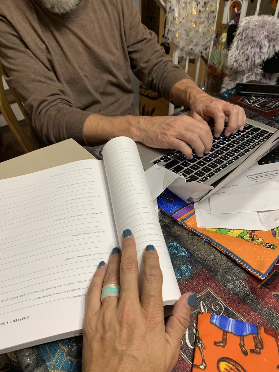 This is how you spend a Friday night. Husband, who is a better at typing  than you, types out your questions for your graduate class that you will then answer.  #truelove #gradstudent #AcademicTwitter #academicstruggles #16yearsmarried #FridayNight #lovethisman