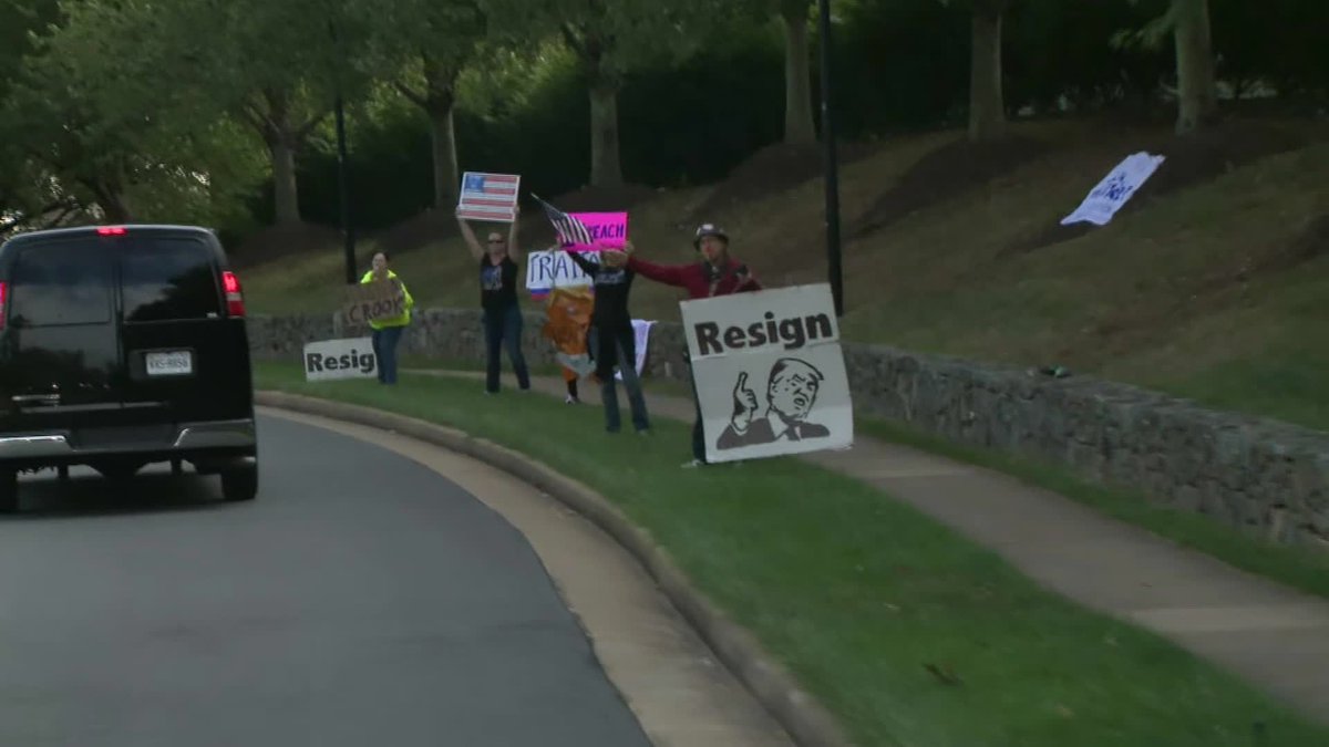 JasonKMorrell's tweet photo. here are the protesters who greeted the president as he arrived at the Trump National Golf Club https://t.co/Q7pS5CSMXP