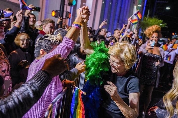 Elizabeth Warren and supporters cheer at the Las Vegas Pride Parade.