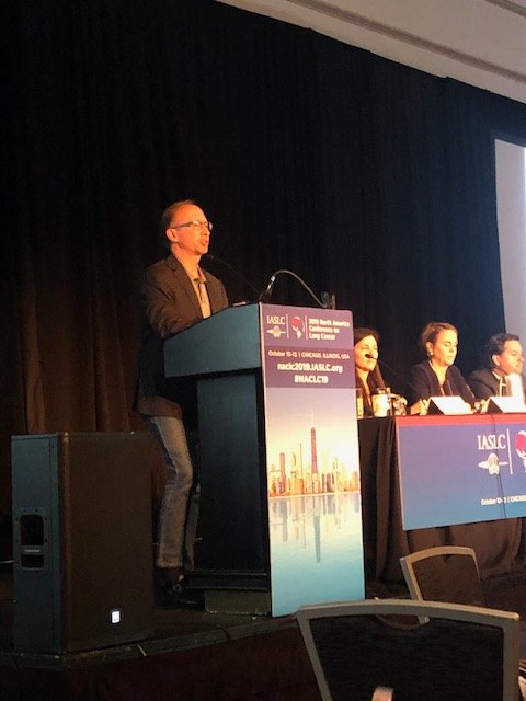 IASLC's tweet photo. Dr. Thomas Gajewski from @UChicago shows that the composition of the gut microbiome influences the response to #immunotherapy. Incorporating "living drugs" to IO treatment may improve responses in patients #NACLC19 #LCSM. https://t.co/NnsgHxgrWx