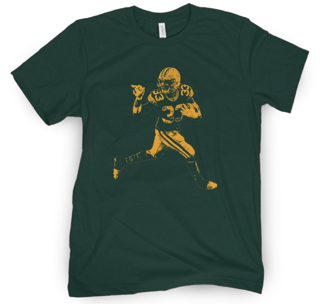 <a href="/Showtyme_33/">Aaron Jones 3️⃣3️⃣</a> You guys asked, we delivered. 

BUY HERE: store.barstoolsports.com/products/wave-…

Oh and since the NFL fined Jones $10.5k for the wave, if the shirt sells, Barstool will donate $10.5k to the charity of his choosing. This way at least the fine will go towards a cause close to Jones' heart.