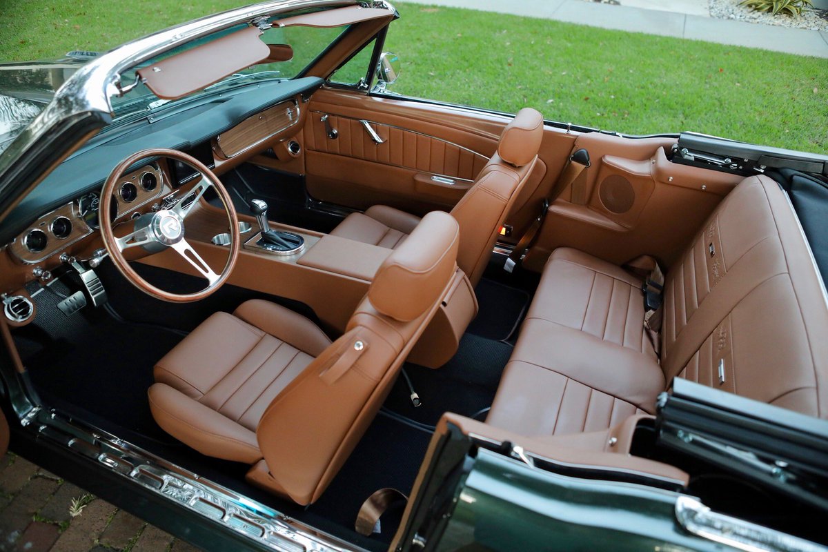 RevologyCars's tweet photo. Latest deliveries! This is a 1966 #Revology #Mustang GT Convertible in #IvyGreen Metallic with a stunning Mercedes Saddle Brown interior. Powered by a 435hp Ford 5.0 #Coyoteengine with Ford 6R80 automatic transmission, Borla dual exhaust, styled aluminum 16x8 wheels, and more! https://t.co/57wCs6y6JU