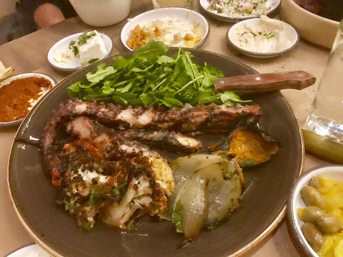 nancytrejos's tweet photo. Epic dinner at @lamalonyc at #ArloNomad. Middle Eastern fare including this incredible looking cabbage shank (love the knife in it), octopus, tender short ribs, all sorts of mezze (not pictured) and this cocktail with Arak, which I used to drink in Beirut. @ArloHotels https://t.co/ngK0jMddjp