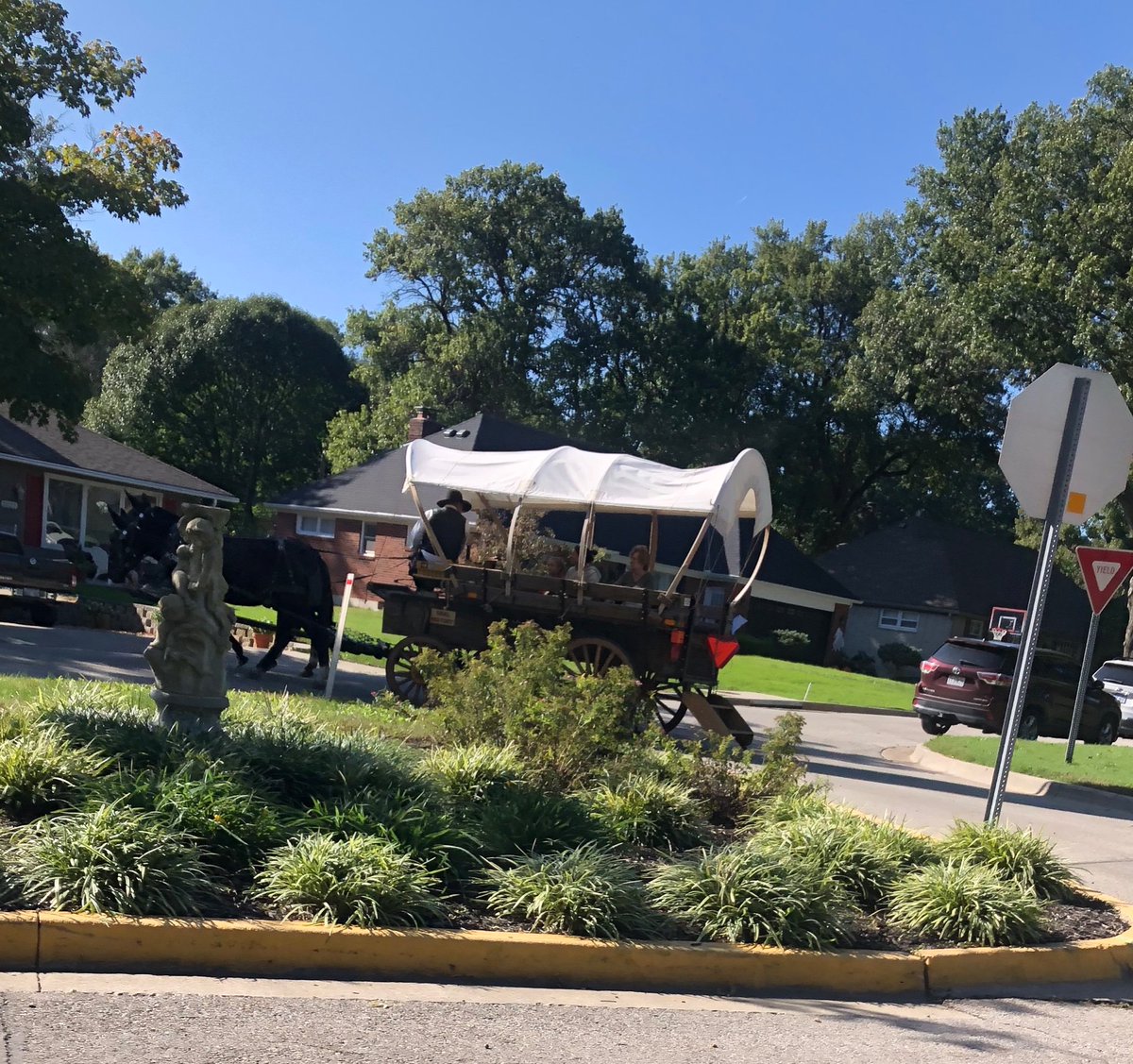 ecansler's tweet photo. I can’t remember from Driver’s Ed if covered wagons automatically have the right of way. Best to proceed with caution. Ad astra per aspera, fellow Kansans. https://t.co/bLtP9tLMNv