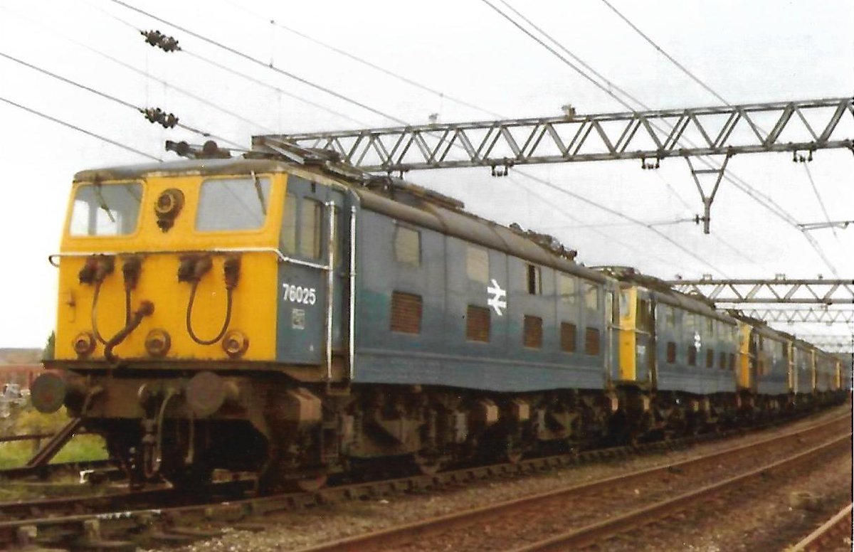 British Rail Woodhead Route Bo+Bo Class 76 1500V D.C. Electric loco 26025 built at Gorton in 1951. Became 76 025 under TOPS. At the head of a long line of 76s at Manchester Guide Bridge 17/5/81 ##BritishRail #Woodhead #Class76 #trainspotting #Manchester #Gorton #GuideBridge 🤓