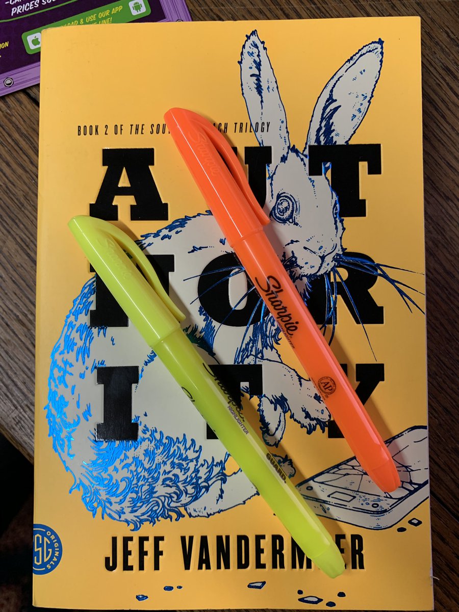 Jeff Vandermeer’s Authority, which has a book cover between orange and yello