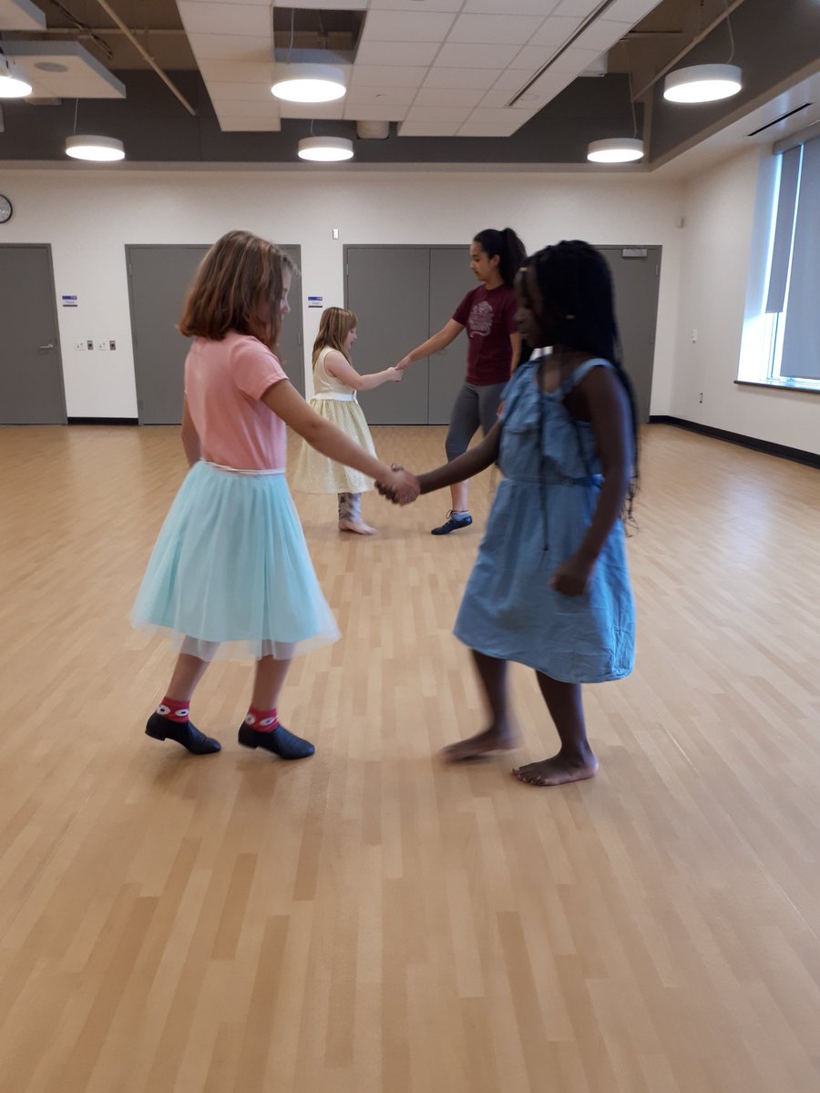 My baby girl teaching her friend next door some irish dancing at irish dance practice