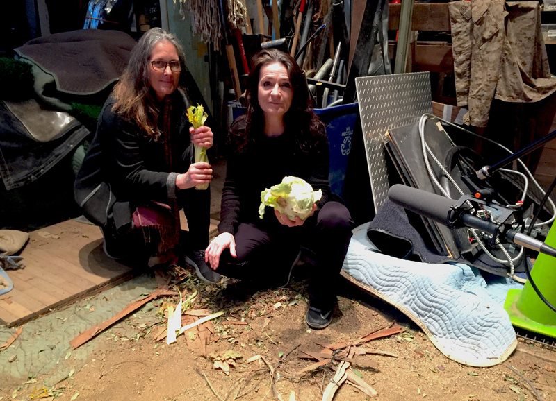 Photo from the Atlas Obscura article:
"Robin Harlan, left, and Sarah Monat-Jacobs, right, pose with two of their co-stars: Celery and cabbage. PAULA MEJIA"