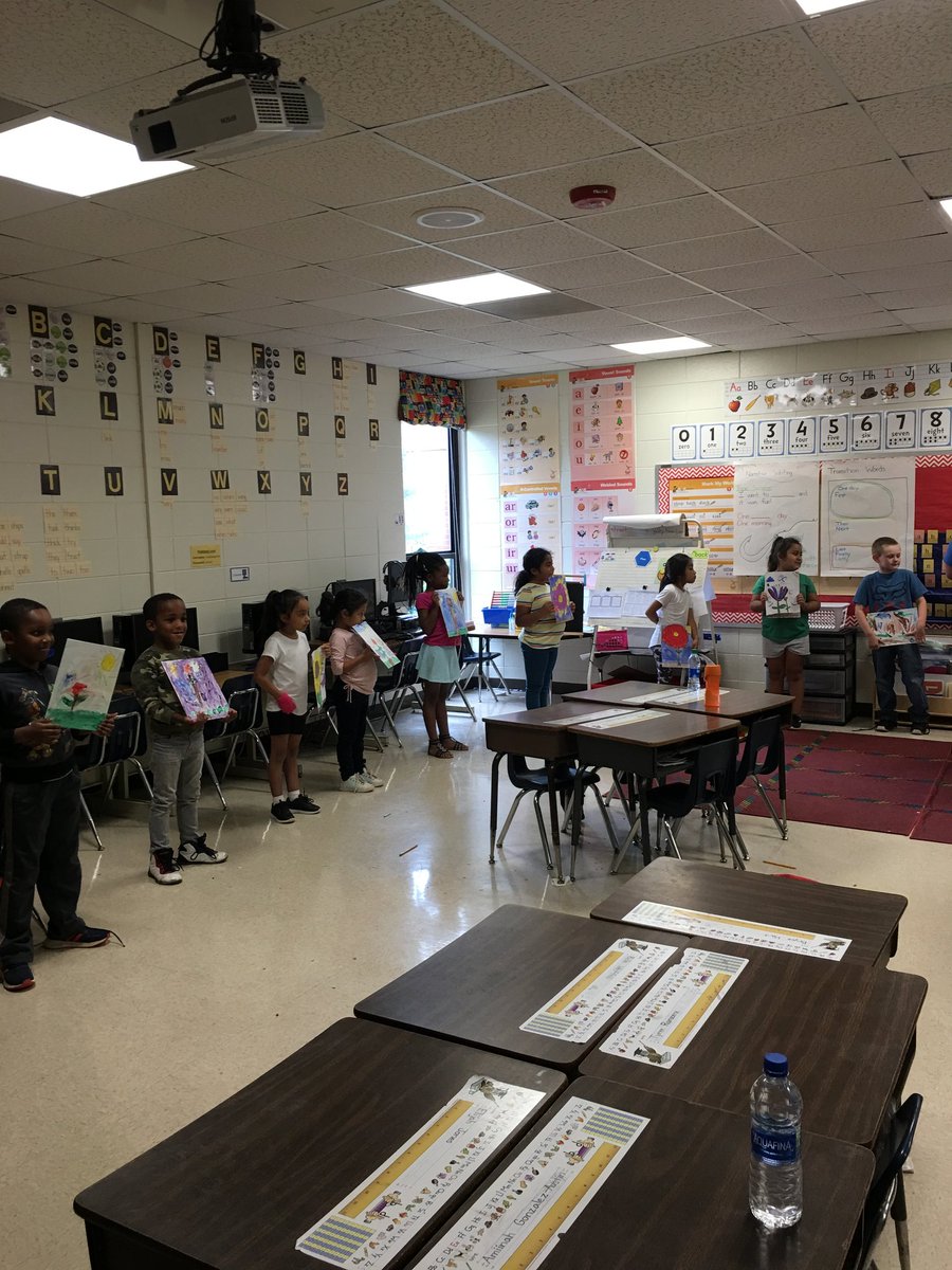 BrookeDye18's tweet photo. 1st grade taking a gallary walk of our Georgia O'keefe inspired plant paintings! https://t.co/dXwsF85jOj