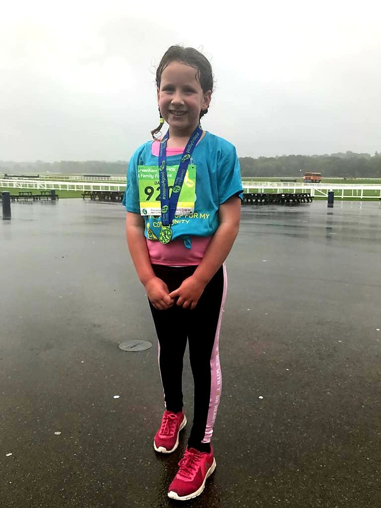 Herders76's tweet photo. Despite the heavy rain my daughter loved running in the @Greenham_Trust #stepup4good2019 Fun Run at @NewburyRacing. Well done to all involved! https://t.co/7dWjYf5vXI