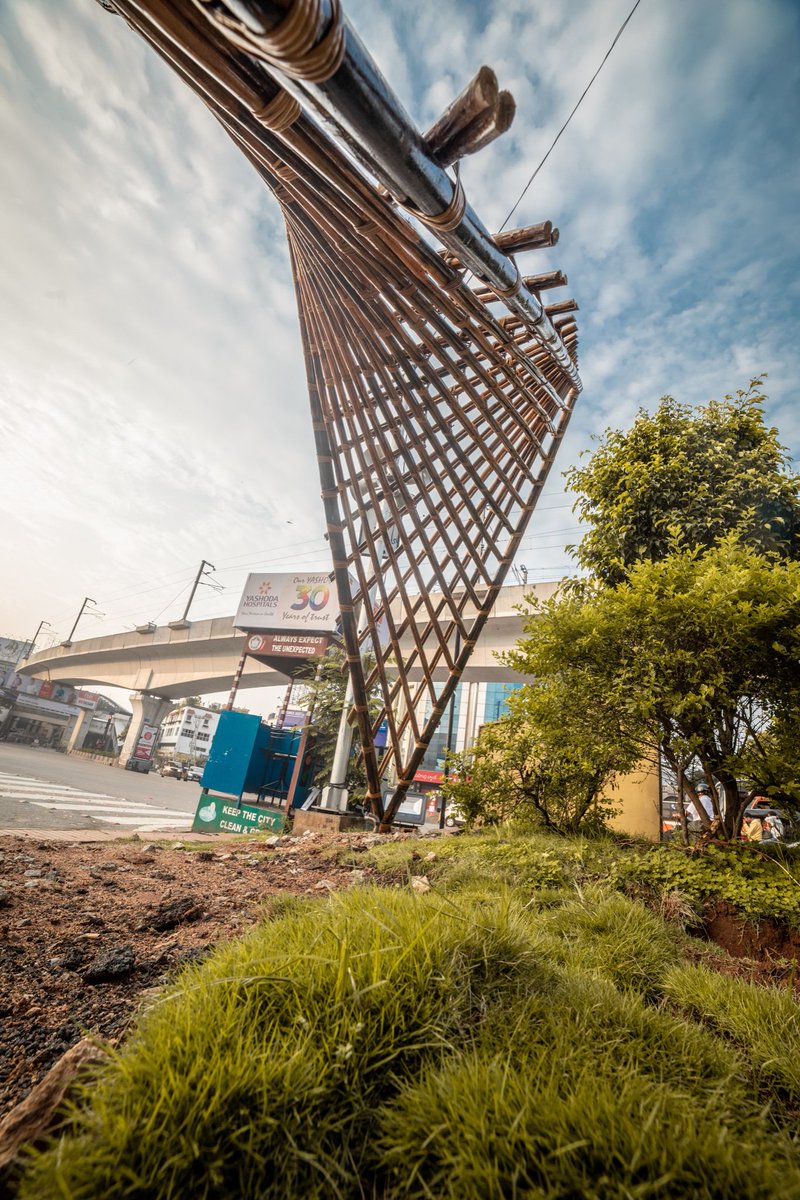 designawareorg's tweet photo. #WeaveX 1.2: #HypeX is a geometric surface called the hyperbolic paraboloid or hypar, made from straight members of cane. It was fabricated by Bombay Cane Works and made possible by support from @HydDesignWeek and @ZC_Khairatabad. HypeX is at #Khairatabad X Roads! #HYDESIGN https://t.co/9EXDwfQaFY