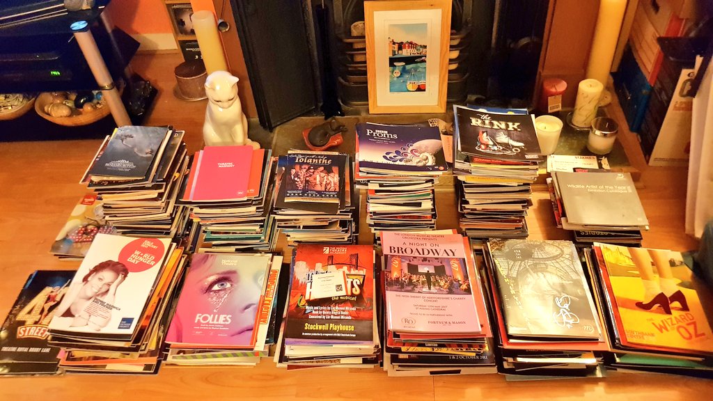 f1roro's tweet photo. Weekend project has been cataloguing my 40 year collection of theatre programmes... they're now listed, dated and rough sorted (size/alpha) ready to be put away again. But how in hell are all these (photo 1) going to fit back in there (photo 2)? #tardisneeded #theatreaddict https://t.co/RMzxEl71ah