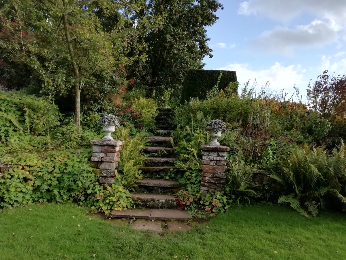 ccalland2's tweet photo. Visited the sunken garden at Acorn Bank yesterday. The garden dates back to the 17th Century. This part contains several sets of steps, terraced paths and a round central pond, with a putti, surrounded by four coy carp figures. This part of the garden is pre restoration. https://t.co/kQiNiX9TzM