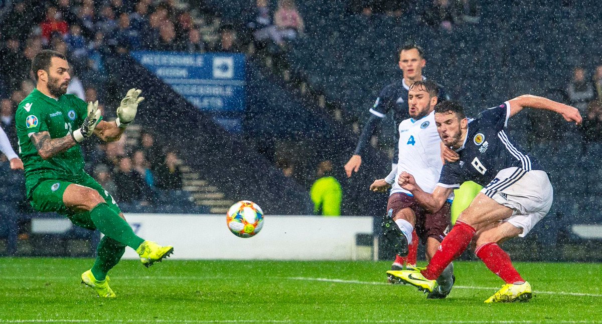 San Marino's goalkeeper picks up the ball outside the box in blunder
