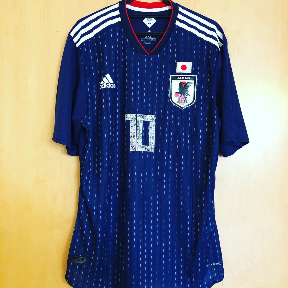  @japanfootball_a Home Kit, 2018AdidasPersonalised: キャプテン翼, 10Did anyone say international break? This (fake) replica of Japan’s 2018 World Cup shirt celebrates popular manga series “Captain Tsubasa”. The pretty cool numbering contains stills from the cartoon.