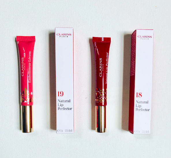 Clarins intense garnet. Clarins natural lip perfector 17. Clarins блеск natural lip perfector 18 intense garnet. Clarins lip perfector 19. Clarins natural lip perfector plum shimmer.