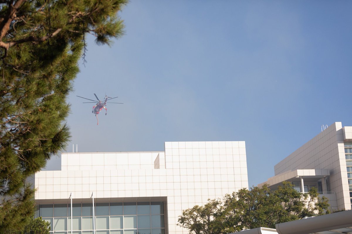 October 28, 2019: A fire helicopter flies over the Getty Center.