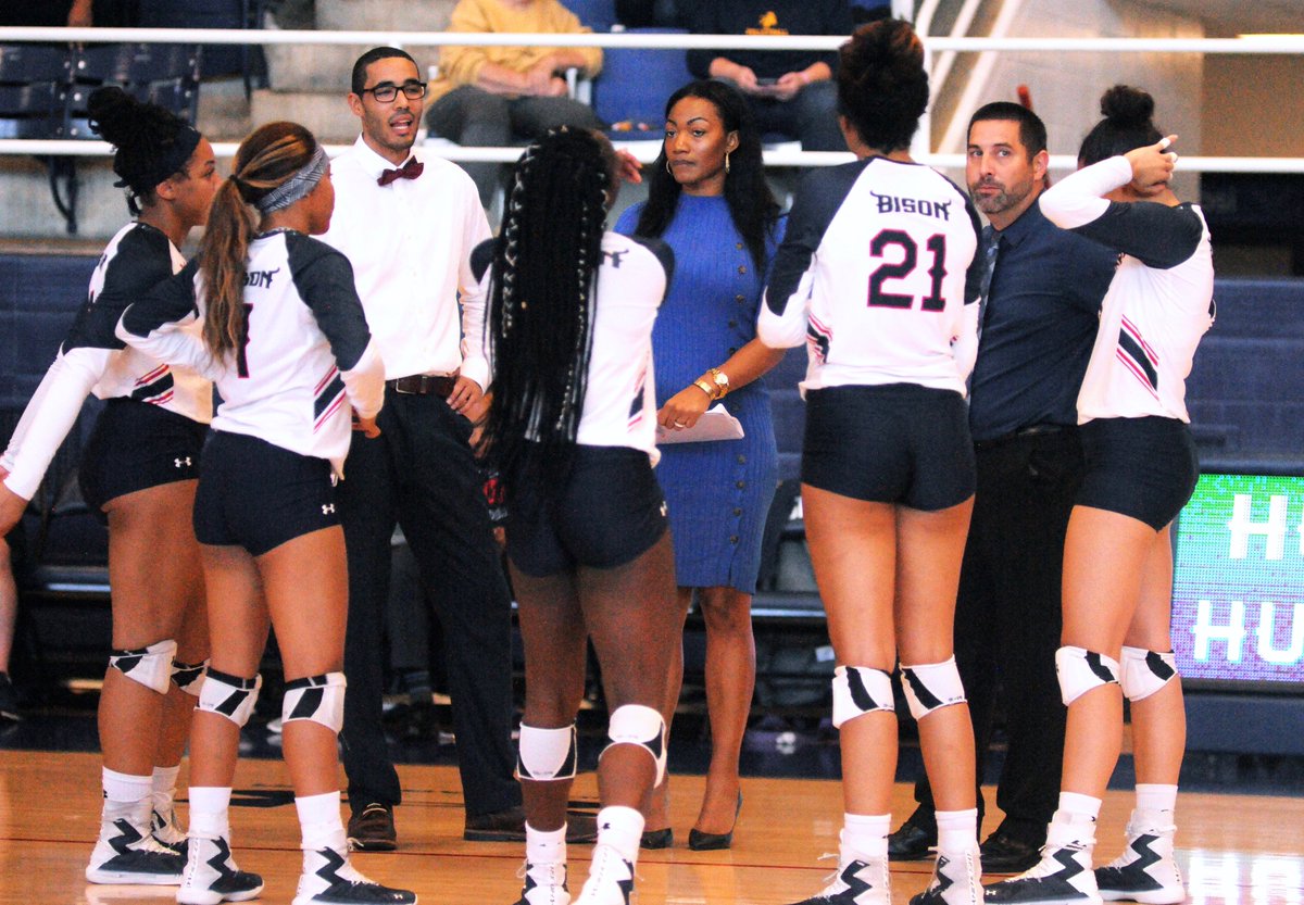 edwardcjones3's tweet photo. It's a rare moment to capture an unobstructed image of the trio of @HUBisonVB coaches @CoachJuJu11 @CiaraIJones and @coachkup interacting with the active players during a time out as in yesterday's tough 5-set match with @NcatVolleyball at #TheBurr. @howardu won 3-2. @MEACSports https://t.co/vy4Xj06jTj