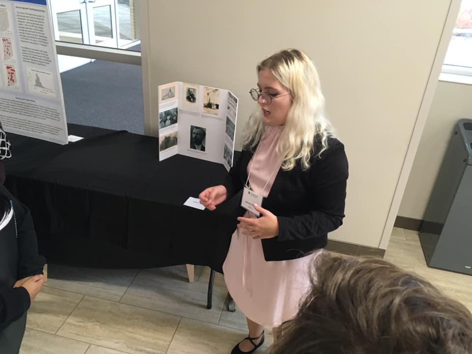 WelcomeProject3's tweet image. Welcome Project undergrad researcher Joy Holland presents her findings on St John's Lutheran Church at @ValpoU FiRES exhibition.