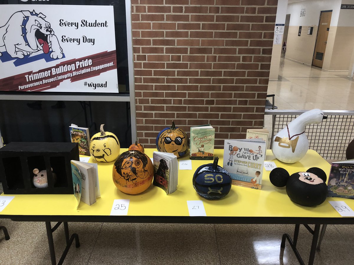 JessHoffman414's tweet photo. WOW! 👀Thank you to all of our Trimmer Bulldogs that have submitted pumpkins for our October Reading Challenge! I am extremely impressed with your creativity! Thank you for sharing your love of reading and artistic skills with the entire school! 💙🐾💙📚 #WYPROUD https://t.co/83cGyCjafw