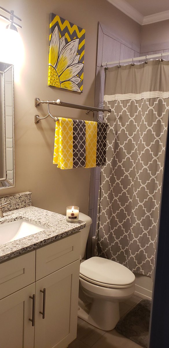 I finally finished one of the guest bathrooms. Nothing major. I love gray & yellow tho