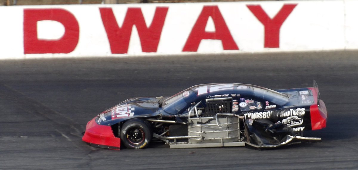 RacingAmerica's tweet photo. #PASSNorth: A tough day at @seekonkspeedway continues for @DerekGriffith12. Heavy left side damage on the No. 12G as he was working his way back through the field. 

Watch live: https://t.co/WkdBWq0BqV https://t.co/FdjG4iFgnX