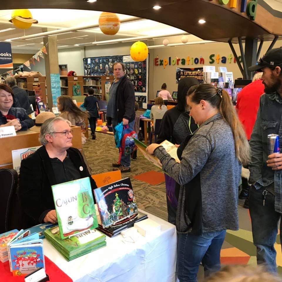 itsmamabearb's tweet photo. That's my husband (@Silmeril) in the middle holding the PJ Mask book sack and the blue gift bags for the kids. They're in the children's area (you can spot my daughter as well) while I tour Author's Alley. #mylpl #lpbookfest https://t.co/9YyOiPTL5D