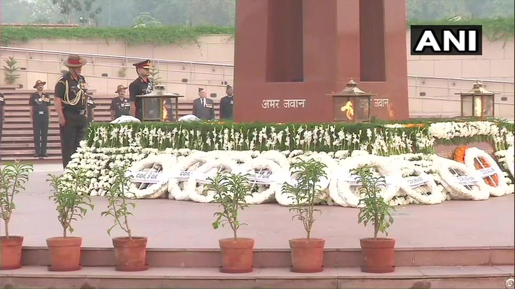 ANI's tweet image. Delhi: Indian Army Chief General Bipin Rawat lays wreath at the National War Memorial on Infantry Day.