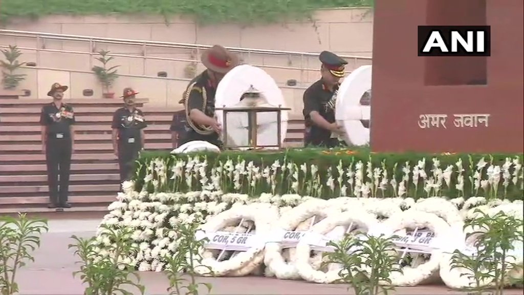 ANI's tweet image. Delhi: Indian Army Chief General Bipin Rawat lays wreath at the National War Memorial on Infantry Day.