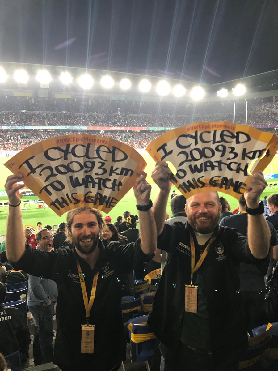DHLRugby's tweet photo. Now that's dedication! 🚴

@RonRutland and @JamesOwens_90 enjoying #WALvRSA at #RWCYokohama

#RaceToRWC #EpicJourney https://t.co/G361U4pDXG