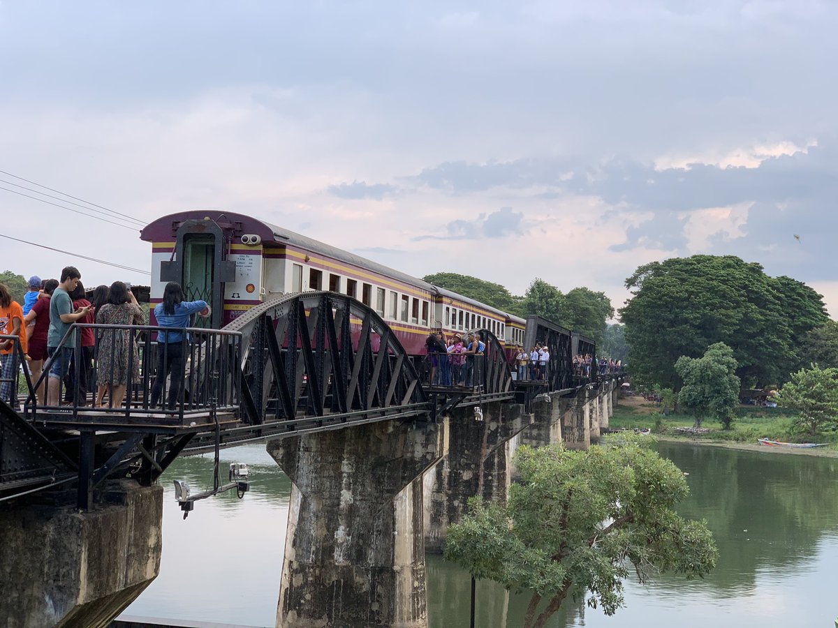 The train travels so slowly on the bridge that it gives one can opportunity to settle at different places to take photos. The bridge is packed with tourists from all over the world. &ndash; bei  สะพานข้ามแม่น้ำแคว (The Bridge of the River Kwai)