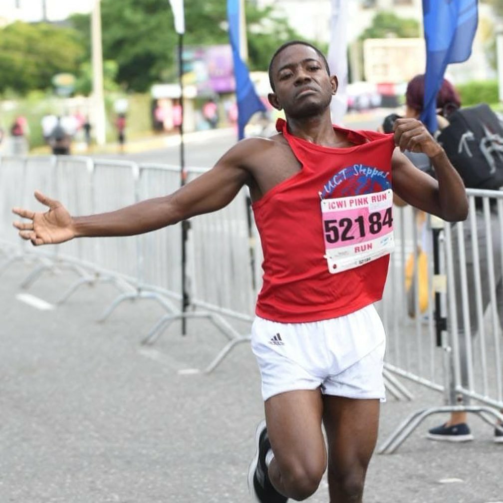 JamaicaGleaner's tweet photo. A job well done for 25-year-old Henry Thomas of UCT Steppas who placed first in a time of 16 minutes and 31 seconds at the 2019 #ICWIPinkRun. #GLNRPics https://t.co/aTEhqChwub