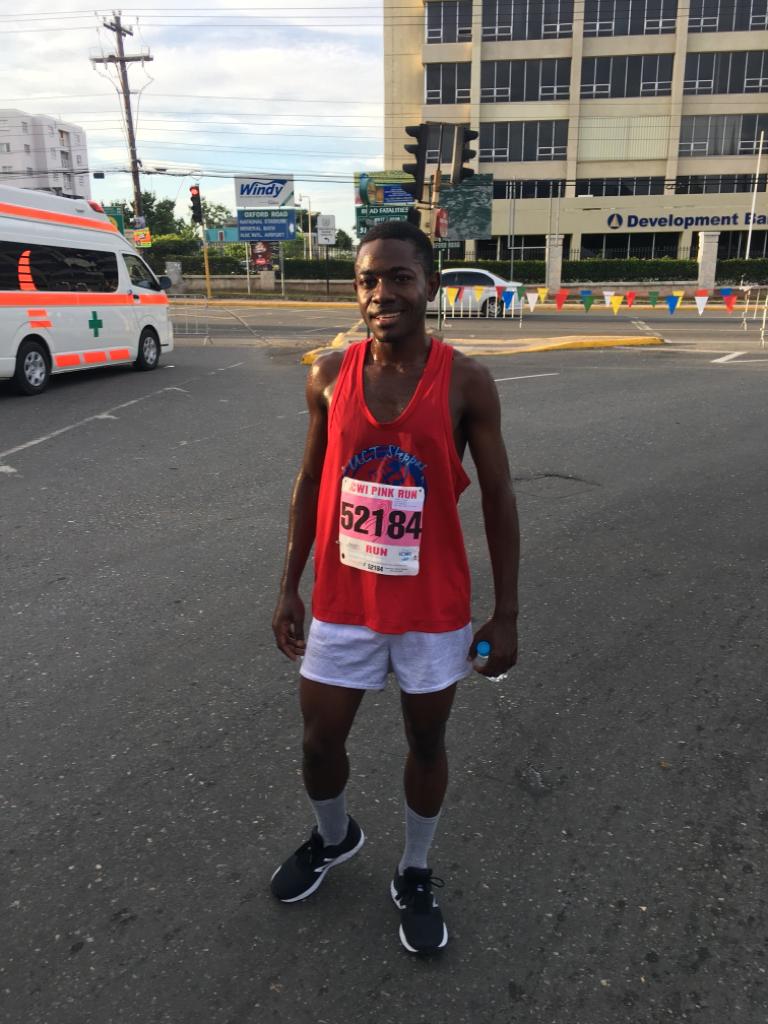 JamaicaGleaner's tweet photo. A job well done for 25-year-old Henry Thomas of UCT Steppas who placed first in a time of 16 minutes and 31 seconds at the 2019 #ICWIPinkRun. #GLNRPics https://t.co/aTEhqChwub