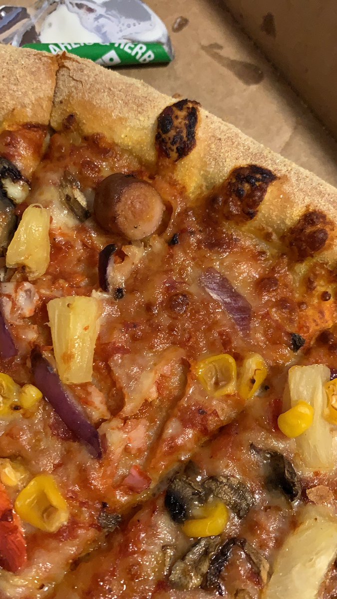 Could <a href="/Dominos_UK/">Domino's Pizza UK</a> explain why there has been a Hot Dog added to my pizza; is this a racist joke at my expense?
