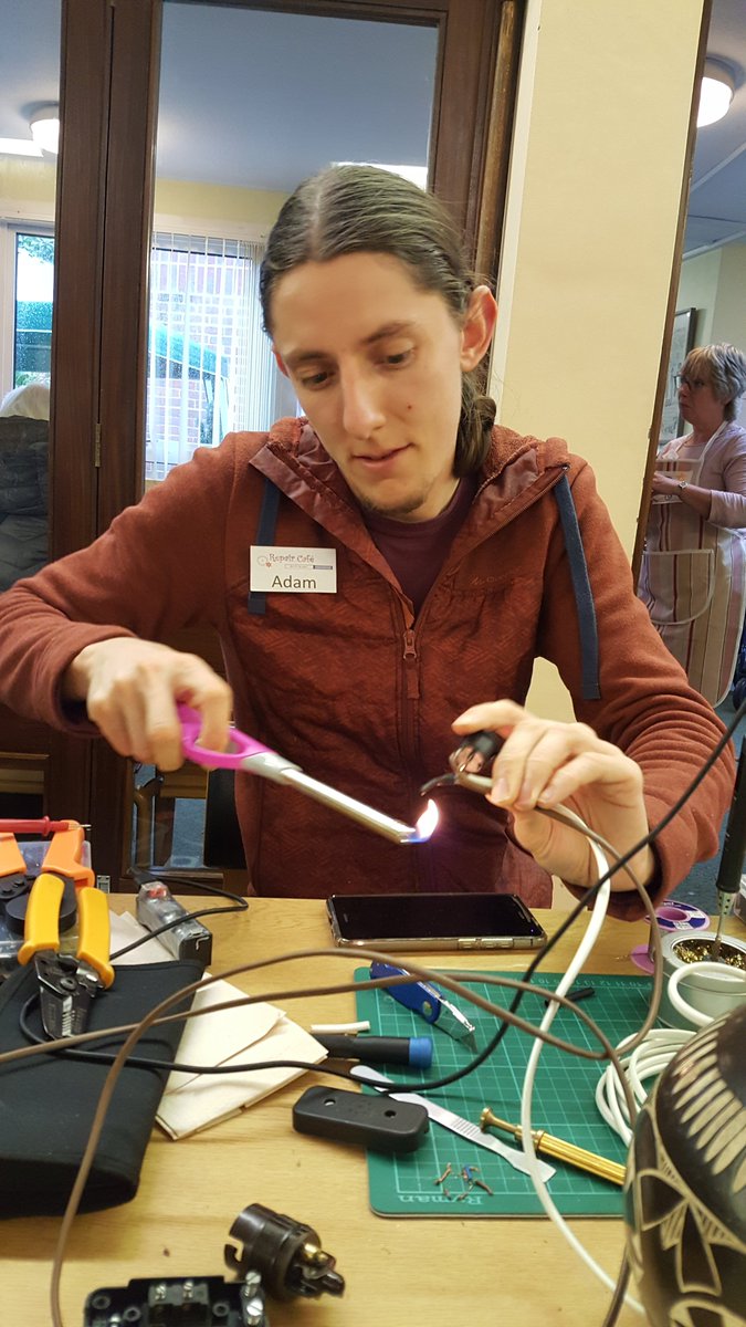 ruthvalerio's tweet photo. So impressed with the local monthly Repair Cafe. Thank you to Dan who fixed this long-broken lamp that was a gift from my parents. What a good scheme! #repair #dontthrow https://t.co/V0MYWa9jBE