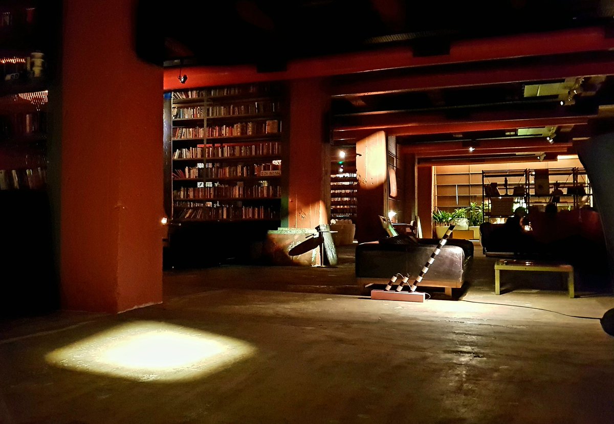 HansGutbrod's tweet photo. This is the new lounge at the #Stamba hotel, replacing the casino. Opened two weeks ago. Darker than in photos, another visually gorgeous location in #Tbilisi. Love the many books, too. https://t.co/aXYhAOup2x