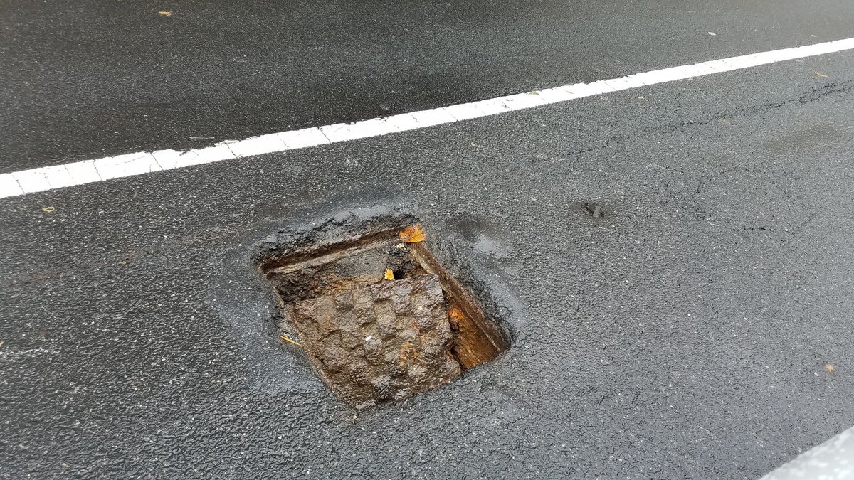 emuhldc's tweet photo. @311DCgov  Drain cover pothole!  South side of 18th, right before the intersection of 18th and G ST NW. @car2go car felt like it fell completety in. Fortunately, tire was ok. https://t.co/g4ySMuXSX6