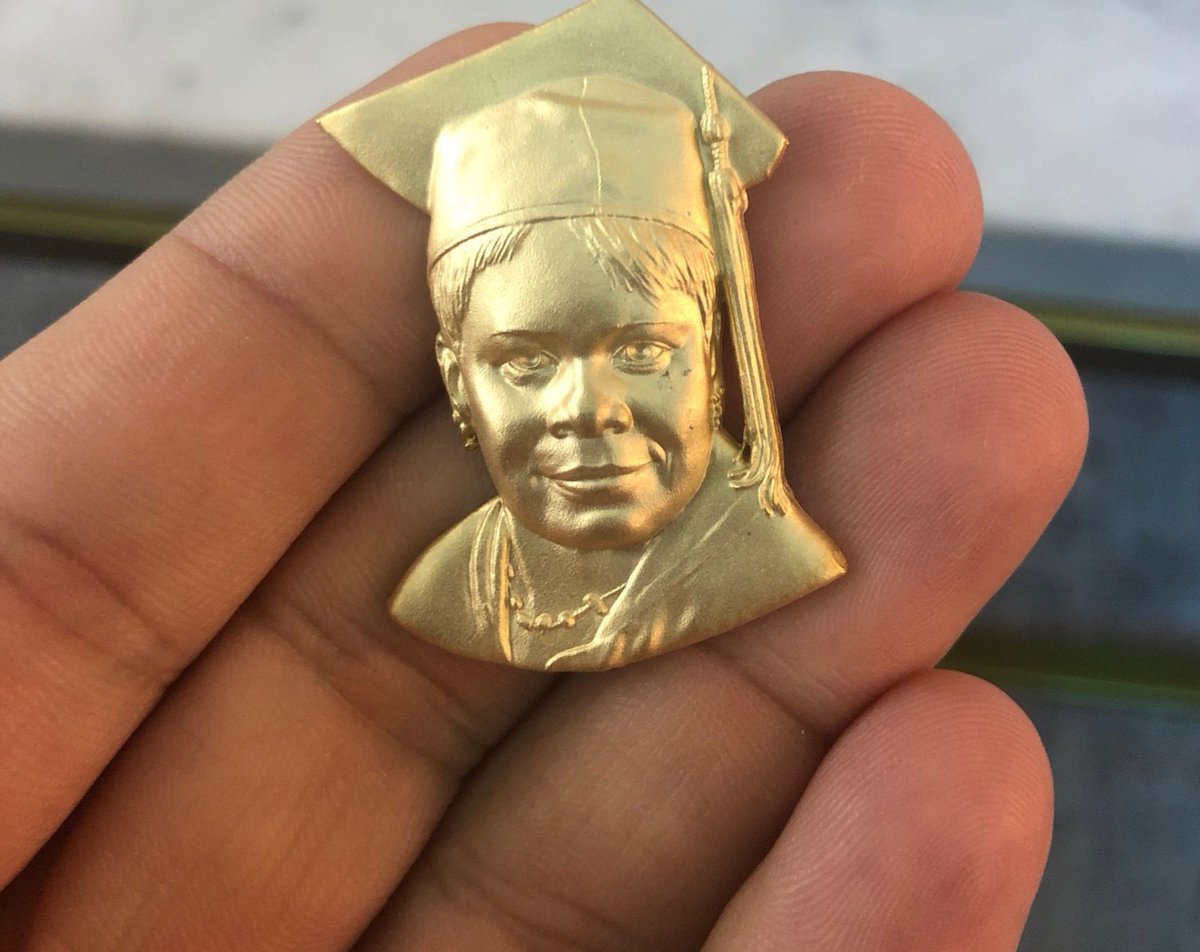 jensfinest's tweet photo. He made one of my graduation pictures into a charm with some powerful words on the back! His actions let me know how much he loves me when words aren't enough @DemetriusHarmon #partofmy❤ https://t.co/t79pNvE9ag