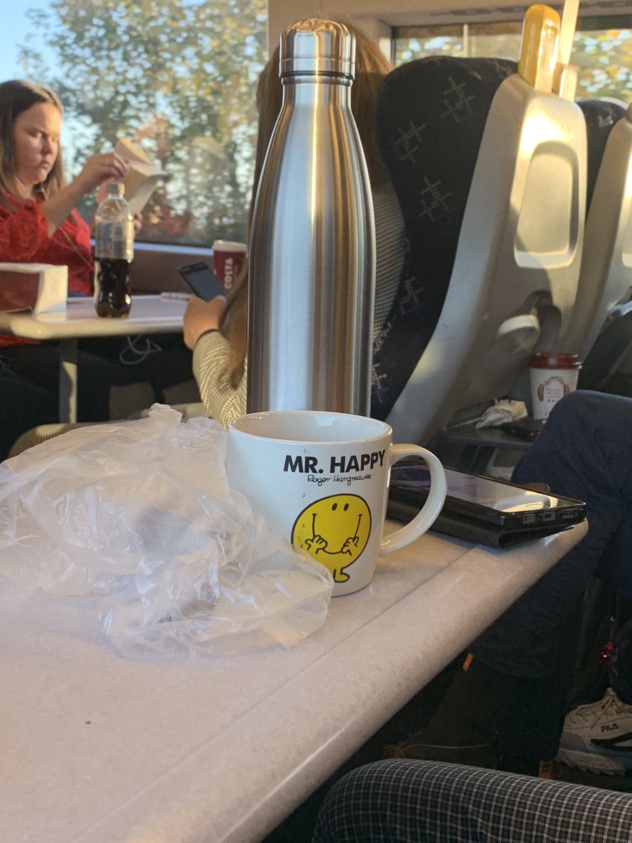 Louisekedwards's tweet photo. Seriously impressed that fellow train passenger has just produced a Mr Happy mug from his bag and now making a cuppa! #traingoals #mrHappy https://t.co/m04YBZUiXY