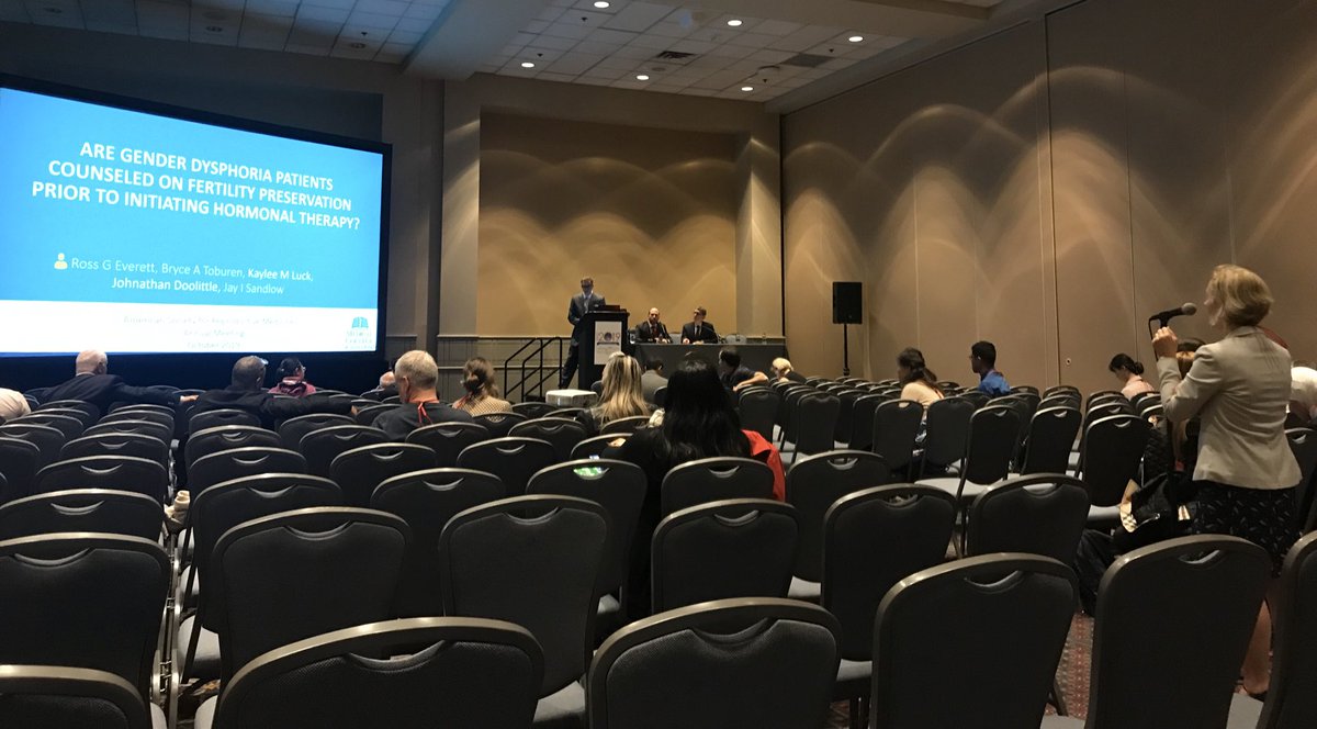 Jayman0827's tweet photo. Dr Ross Everett speaking to a packed house at #ASRM19 regarding #fertilitypreservation in transgender men. This is an area that needs to be studied further to determine barriers, as well as expand access. https://t.co/Y65rJbUuPb