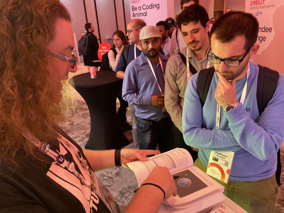 parisba's tweet image. Book signing! #OReillyAI