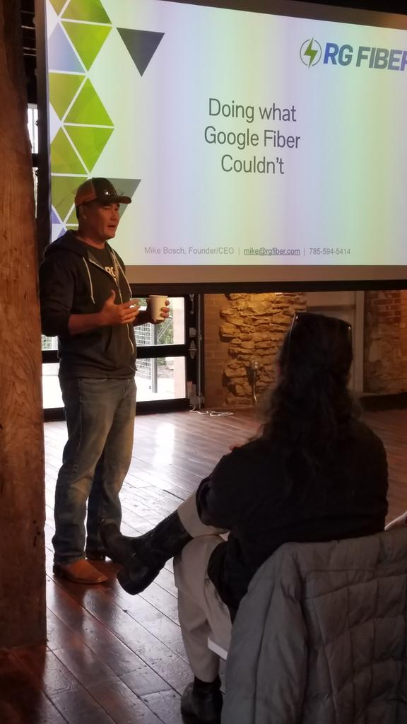 shelpaasch's tweet photo. Made it to my 2nd 1M Cups in @lawrenceks networking and re- connecting. @mikesbosch presenting, giving us the knowledge of all software-driven fiber network with @rgfiber @ecomm_ks #kseship #thisdudeissmart https://t.co/j2UsXInUb4