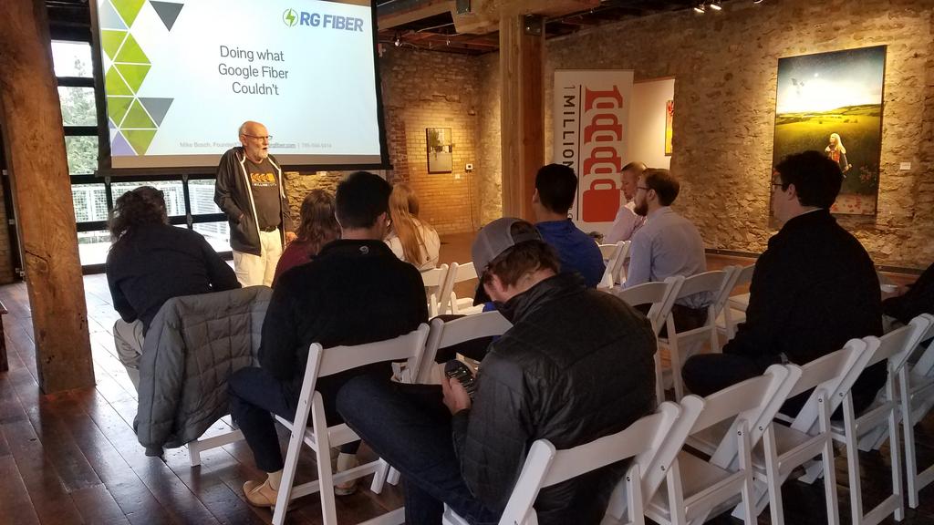shelpaasch's tweet photo. Made it to my 2nd 1M Cups in @lawrenceks networking and re- connecting. @mikesbosch presenting, giving us the knowledge of all software-driven fiber network with @rgfiber @ecomm_ks #kseship #thisdudeissmart https://t.co/j2UsXInUb4