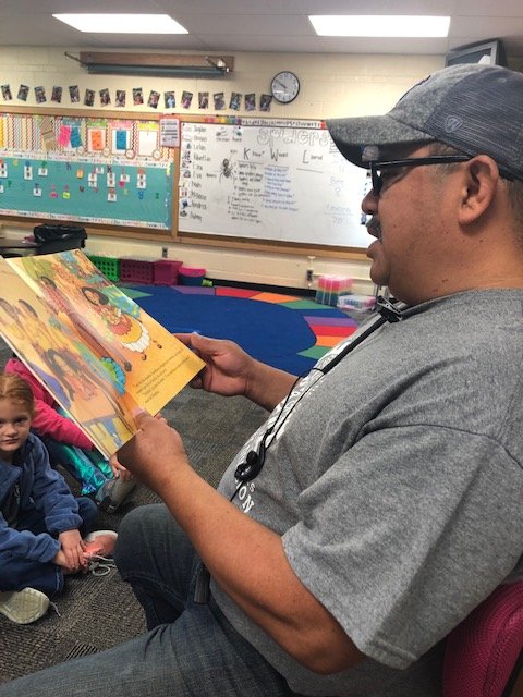 mcleanwildcats's tweet photo. #Relationshipsmatter - check out our amazing custodian, Mr. Ramon, reading a book to Kindergarten in Spanish.  The boys and girls love Mr. Ramon! #WPSProud #WildforMcLean https://t.co/NsB6jyvEjS
