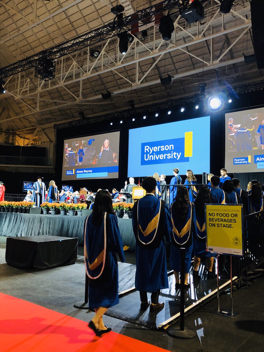 TorontoMet's tweet photo. One by one, the grads are lining up to receive their diplomas 🙌 #Ryerson #convocation #RUConvo https://t.co/tyd3NXLdT4