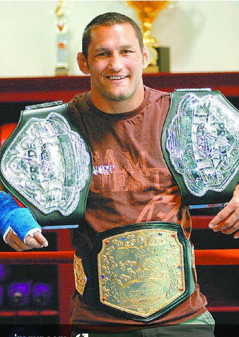 That's the welterweight grand prix belt but here's one with the middleweight belt and the welterweight belt as well as the beautiful grand prix belt. Legend.