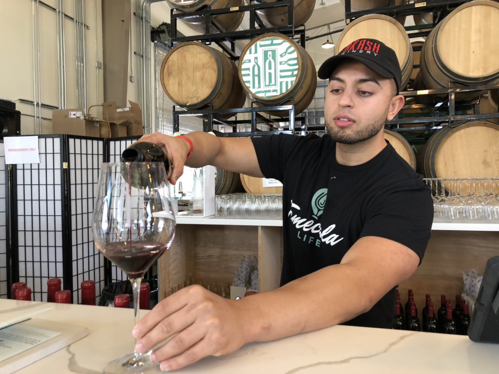 T2Marlene's tweet photo. One of the newer wineries in the valley @AkashWinery opened in 2018, had some renovations &amp; had grand opening this past July... Wine tender Moe pouring a tasty 2016 petite sirah... @visittemecula @TheSDLifestyle @wineadvnetwork @GetawaySD @ThinkerBeach @wine_dp https://t.co/yIi7JFkpZ5