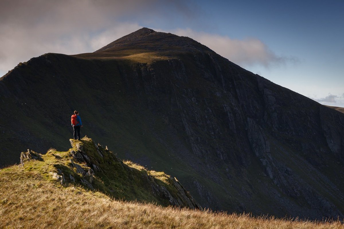 mountainimages's tweet photo. No big vista, Milky Way, lit tent or head torch here. No gimmicks to trivialise the relationship between us and the landscape. Such devices are inappropriate and unnecessary. In this case, a person, a mountain and the light interacting between them are all that's required https://t.co/v9WuQVieOD
